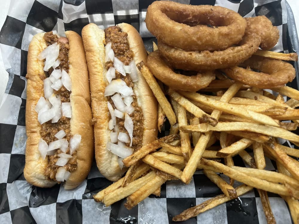 Chili onion dogs with onion rings and fries