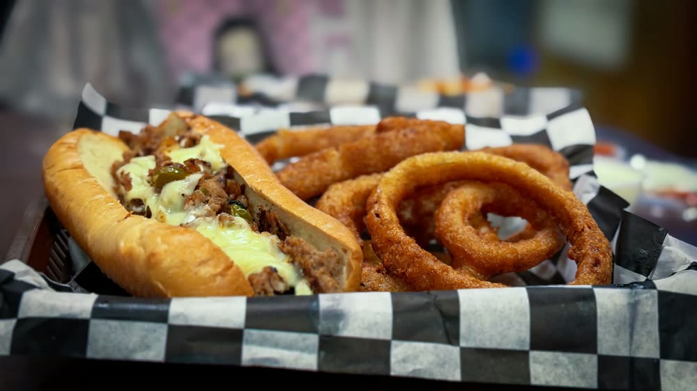 Philly cheesesteak with onion rings